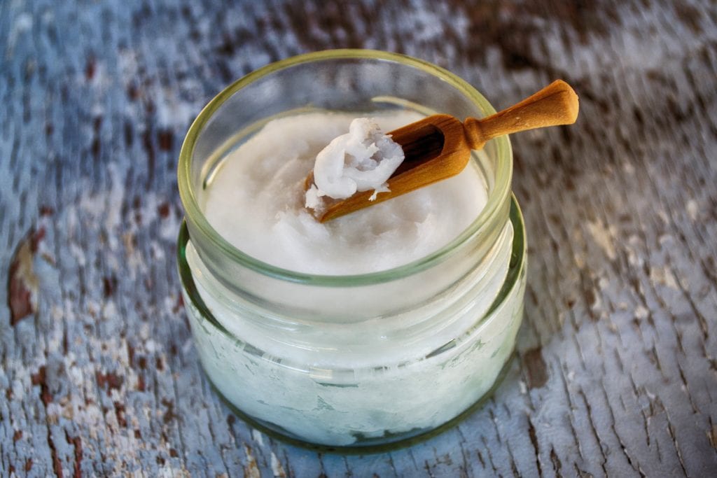holistic health jar and spoon with a natural remedy