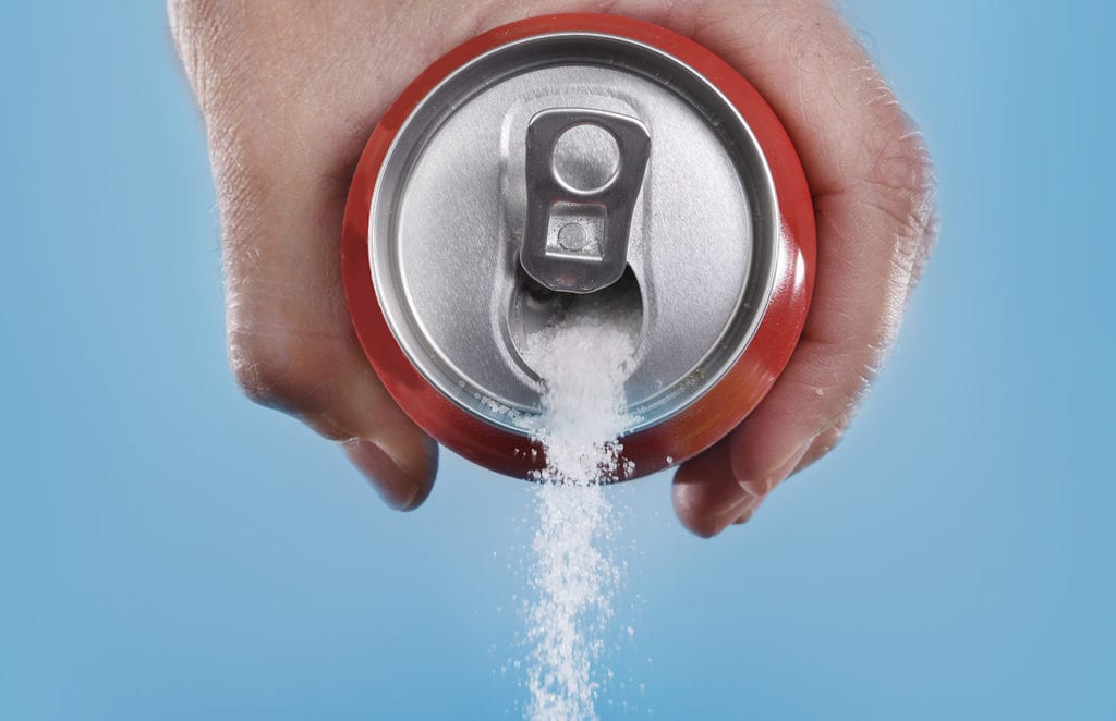 hand-holding-soda-can-pouring-a-crazy-amount-of-sugar