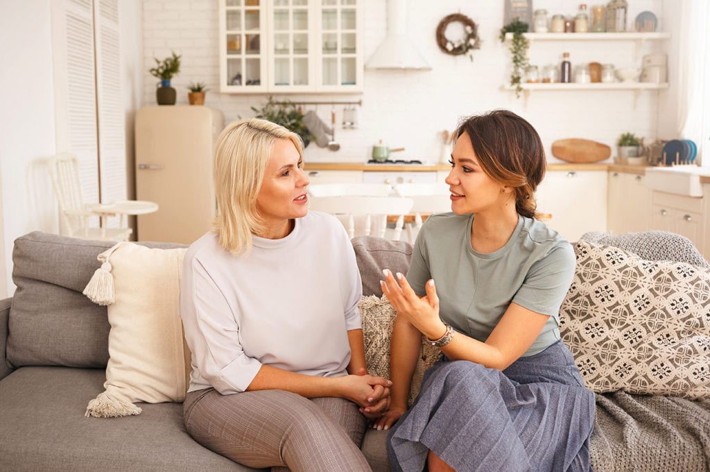 What is the Job Description of a Wellness Coach? 2 A wellness coach works with one of her clients inside of the clients home. The job description of a wellness coach requires coaches to be comfortable working with people in a variety of environments.
