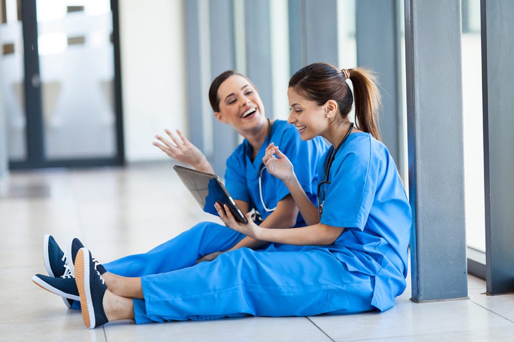 Nurse Burnout: Causes, Statistics, and Warning Signs 10 Two nurses laugh to blow off steam while on break. Taking breaks and maintaining positive relationships with teammates is helpful in preventing nurse burnout.