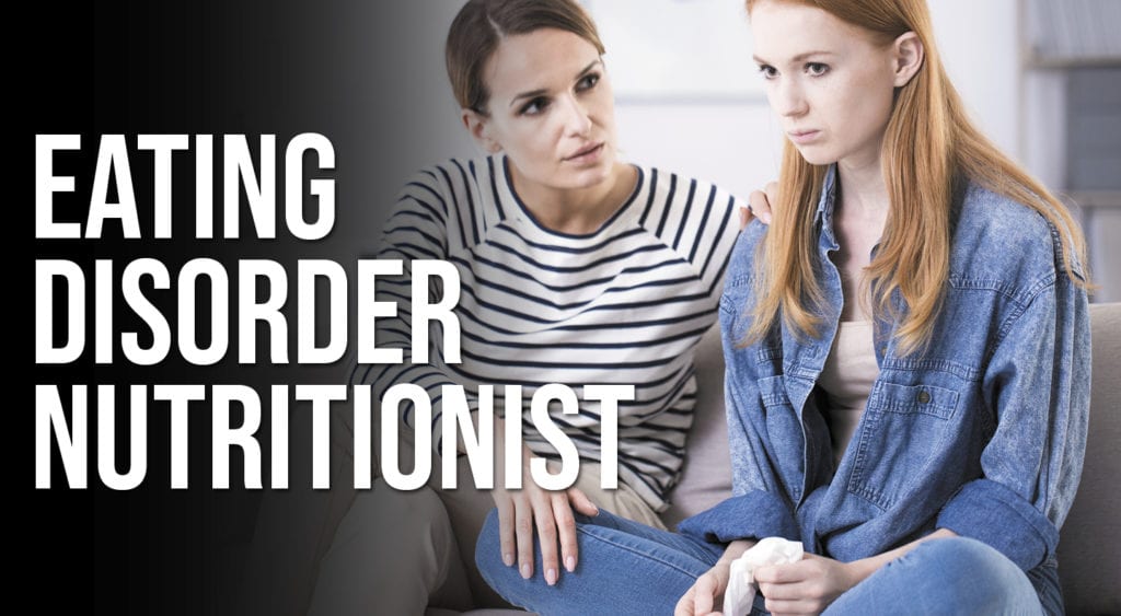 An eating disorder nutritionist counsels a young female client.