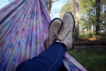 ways to practice self-care - girl laying in hammock