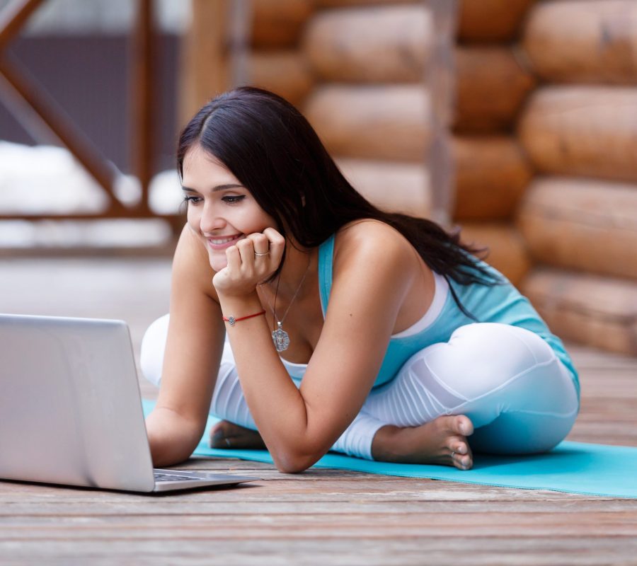 Young,Happy,Fitness,Yoga,Woman,Working,With,Her,Laptop,Sitting